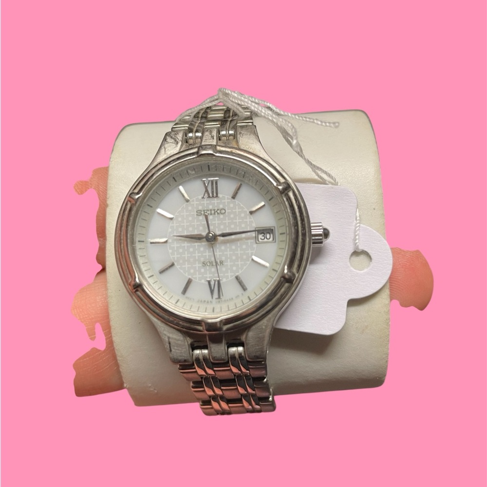 Seiko Silver Timepiece with White Face